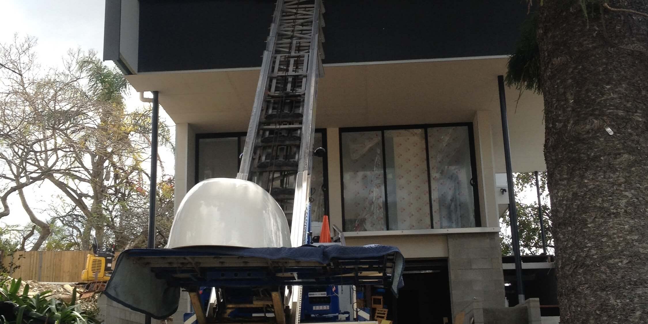 craning_lift_truck_to_safely_move_heavy_building_supplies_bathroom_supplies_on_building_sites_brisbane craning_lift_truck_to_safely_move_heavy_building_supplies_bathroom_supplies_on_building_sites_brisbane