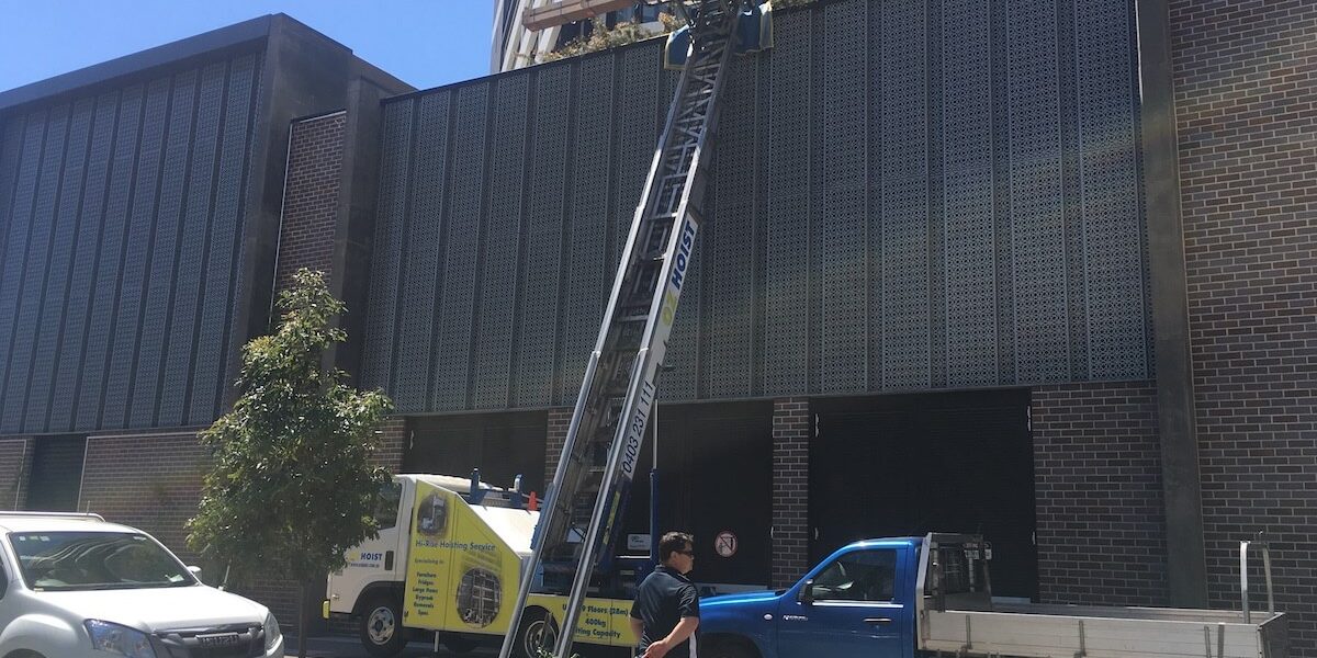 home_builders_lifting_materials_to_high_rise_apartment_oz_hoist_brisbane home_builders_lifting_materials_to_high_rise_apartment_oz_hoist_brisbane