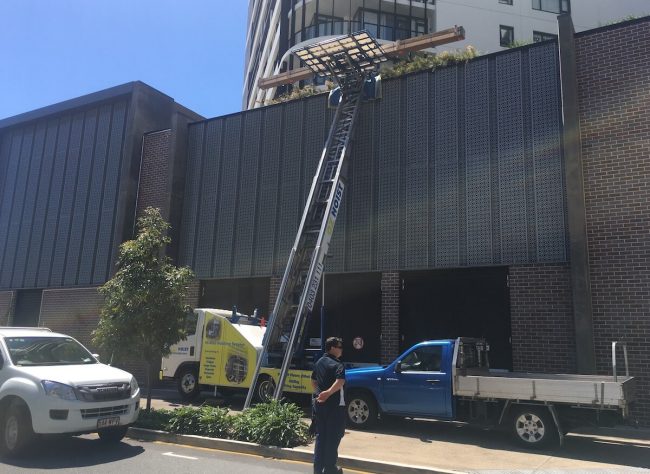 home_builders_lifting_materials_to_high_rise_apartment_oz_hoist_brisbane home_builders_lifting_materials_to_high_rise_apartment_oz_hoist_brisbane
