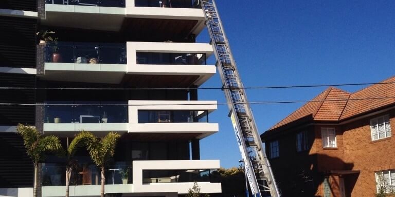 move_in_and_out_of_high_rise_unit_with_truck_hoist_crane_ozhoist move_in_and_out_of_high_rise_unit_with_truck_hoist_crane_ozhoist